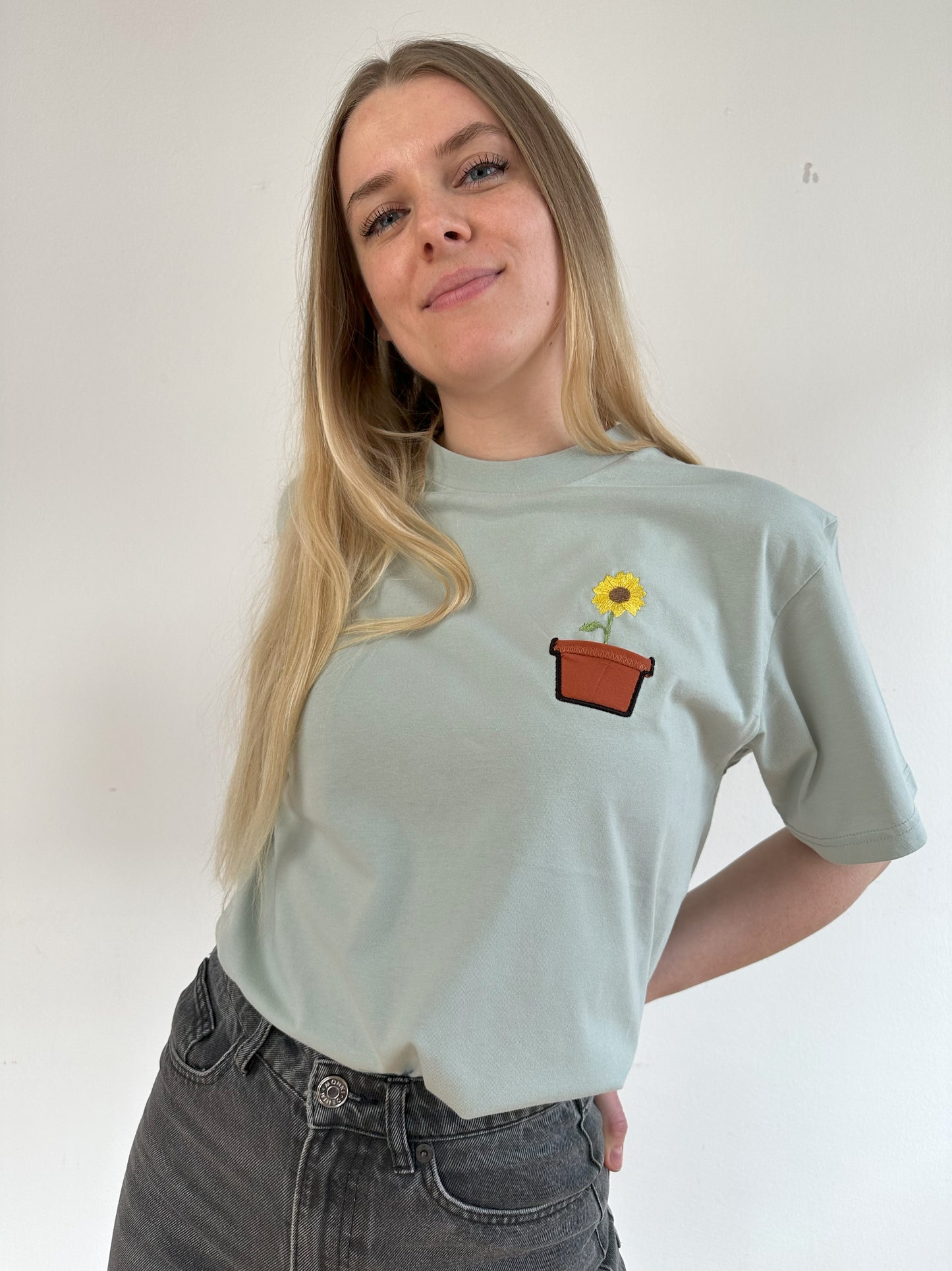 Sonnenblume im Brusttaschentopf