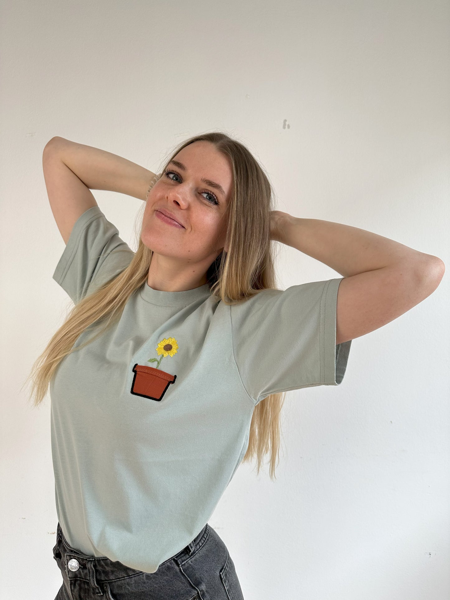 Sonnenblume im Brusttaschentopf