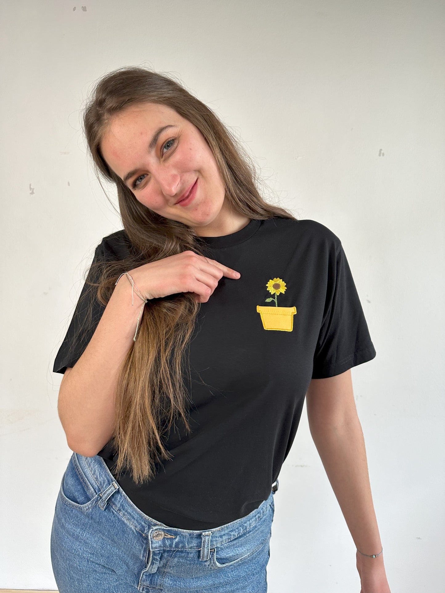 Sonnenblume im Brusttaschentopf
