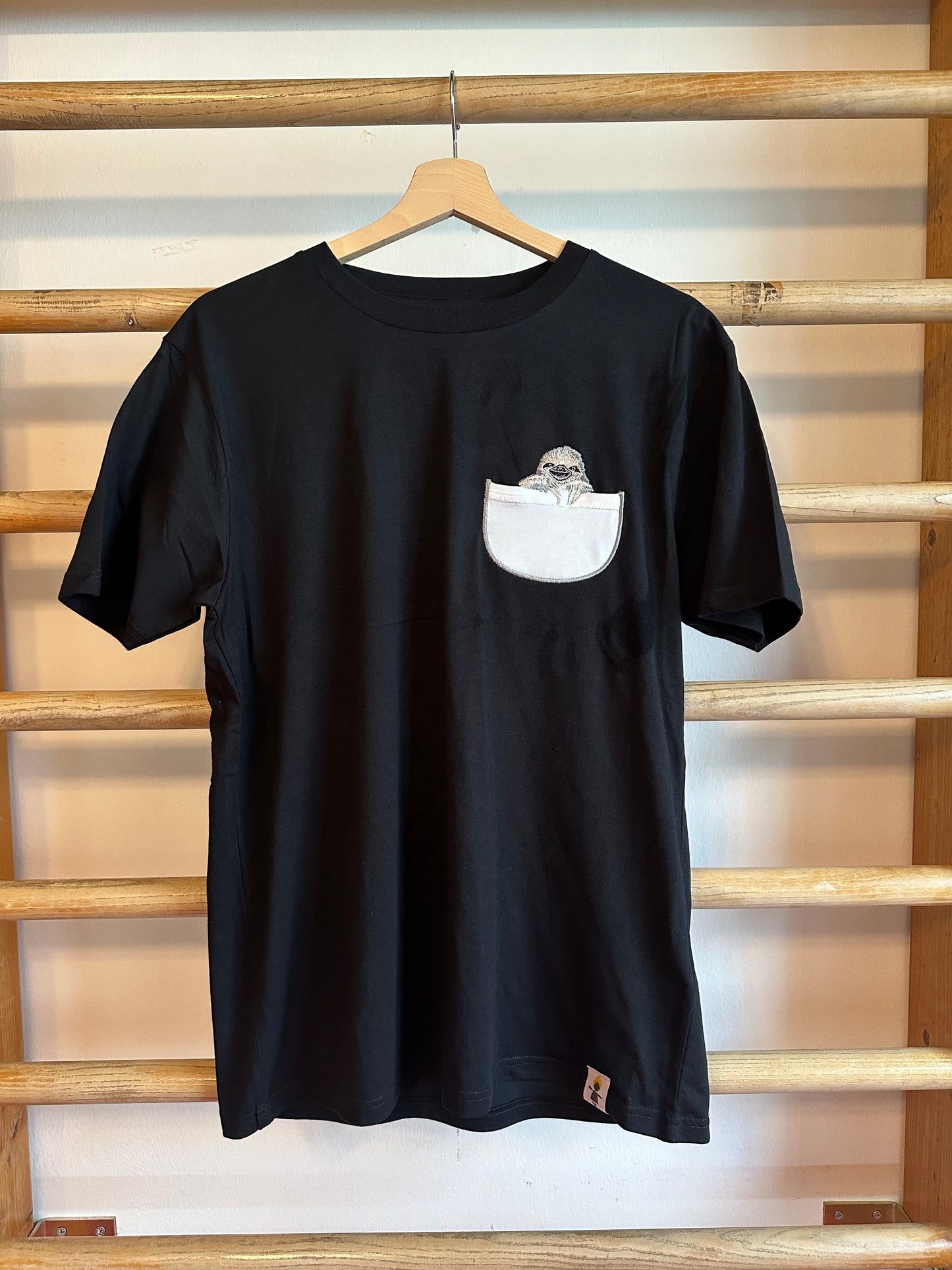 Faultier in der Brusttasche