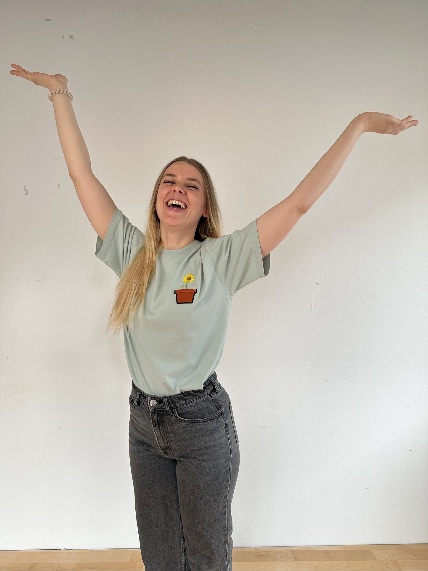 Sonnenblume im Brusttaschentopf