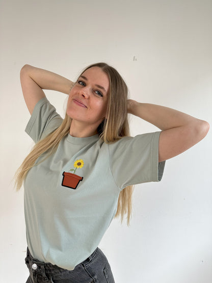 Sonnenblume im Brusttaschentopf