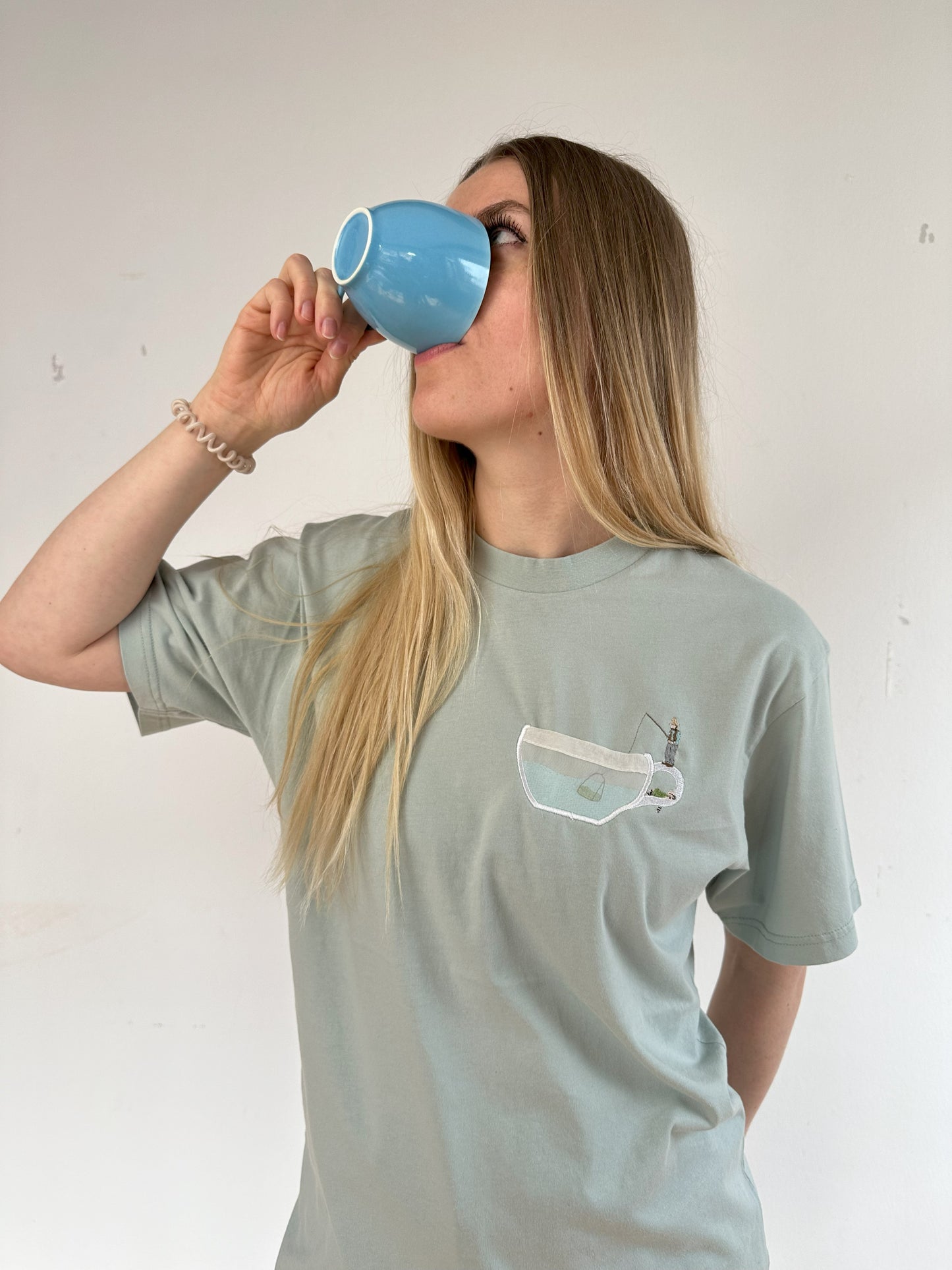 Teebeutelangeln Pettersson und Findus mit Teetassenbrusttasche