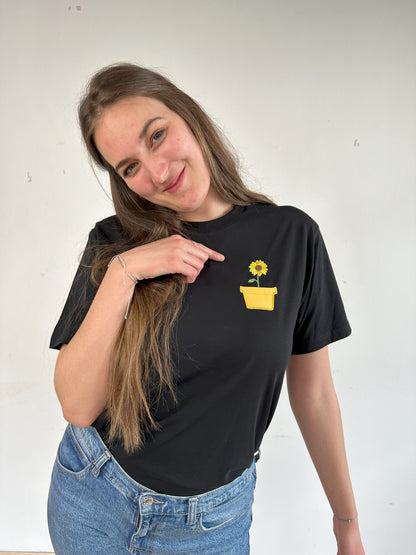 Sonnenblume im Brusttaschentopf