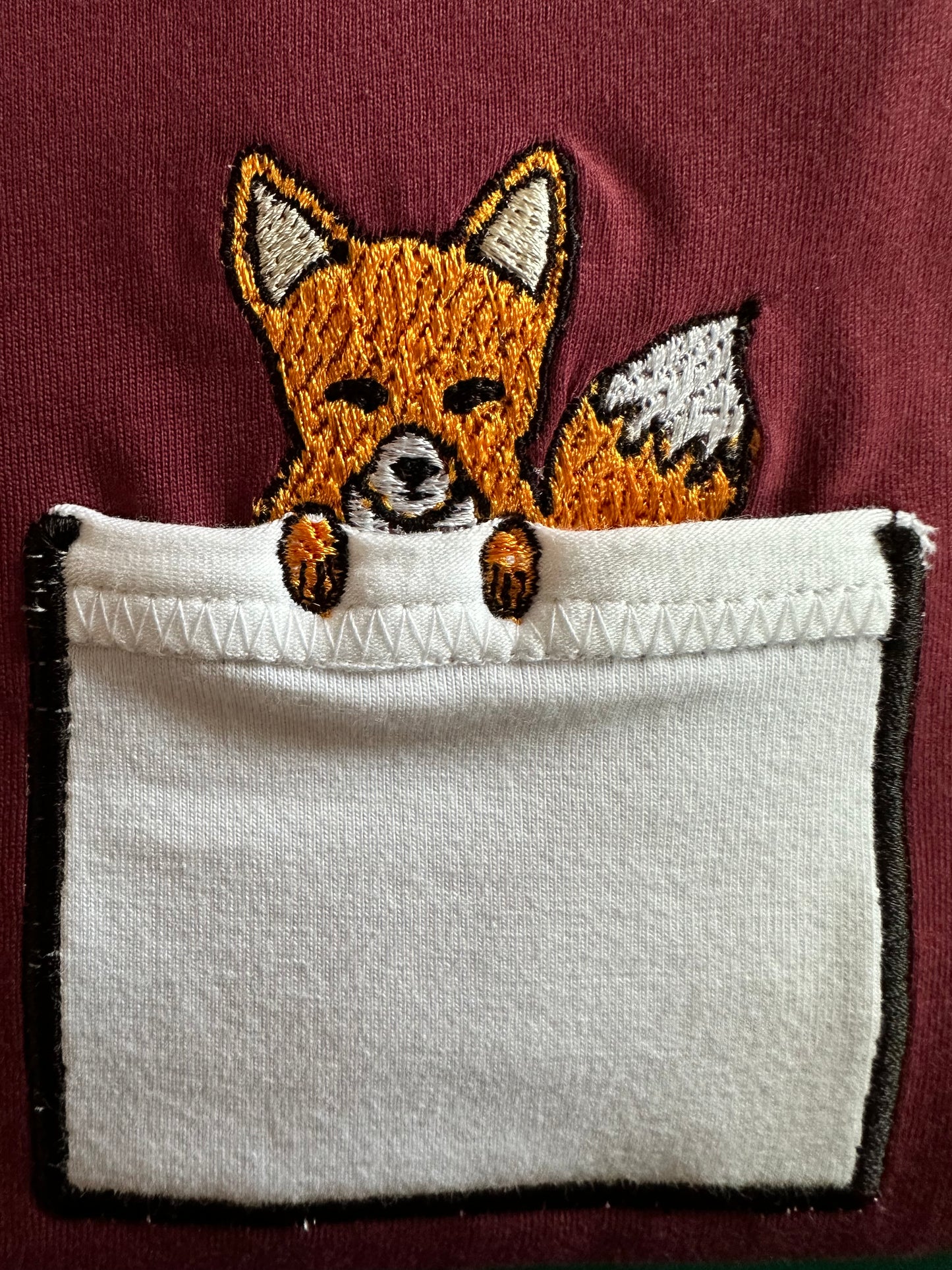 Fuchs in der Brusttasche