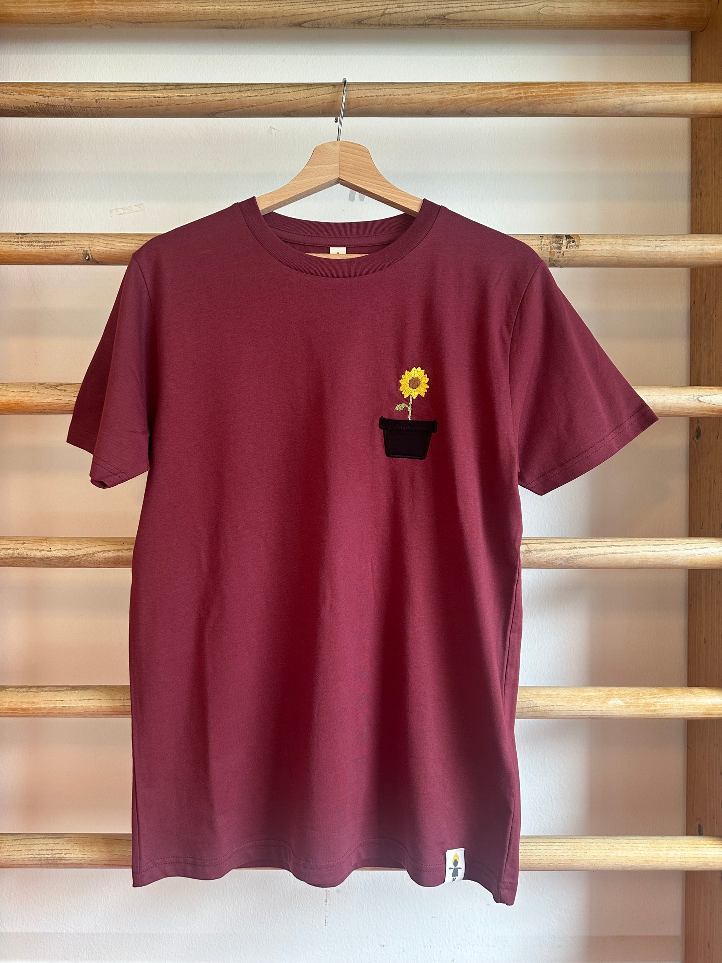 Sonnenblume im Brusttaschentopf