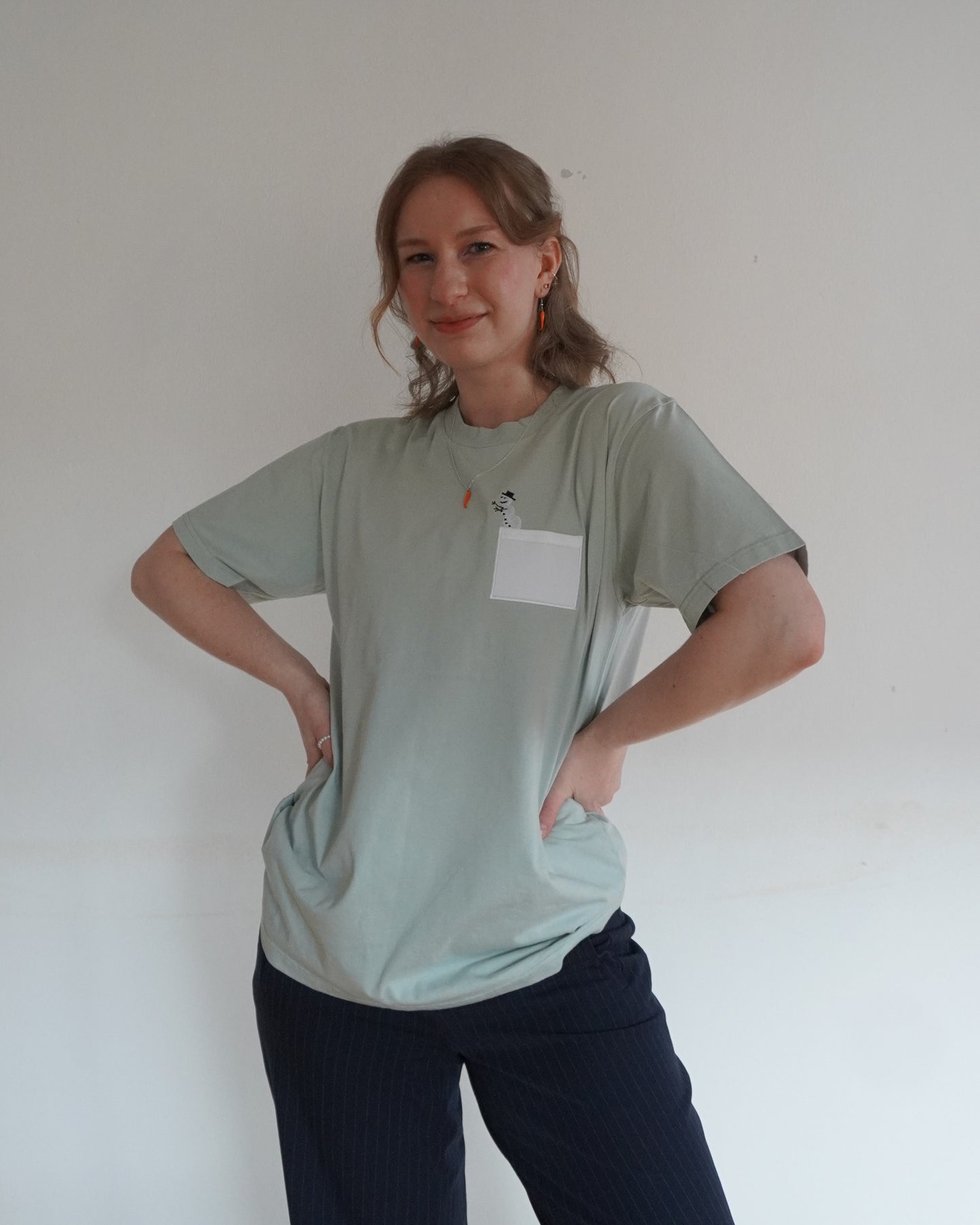 Schneemensch mit Brusttasche